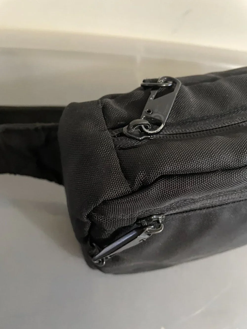 Travel Sling with zipper locks and strap lock